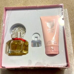 Vince Camuto body lotion/perfume NWTread below